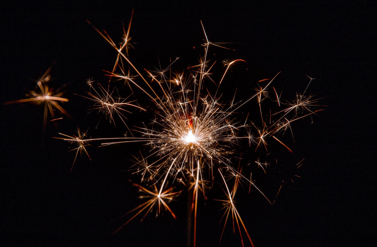Sparkler at a fireworks party.