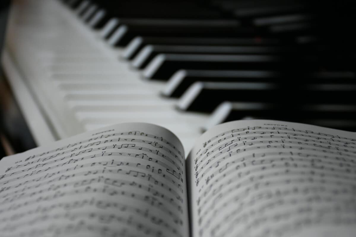 Sheet music and a piano keyboard