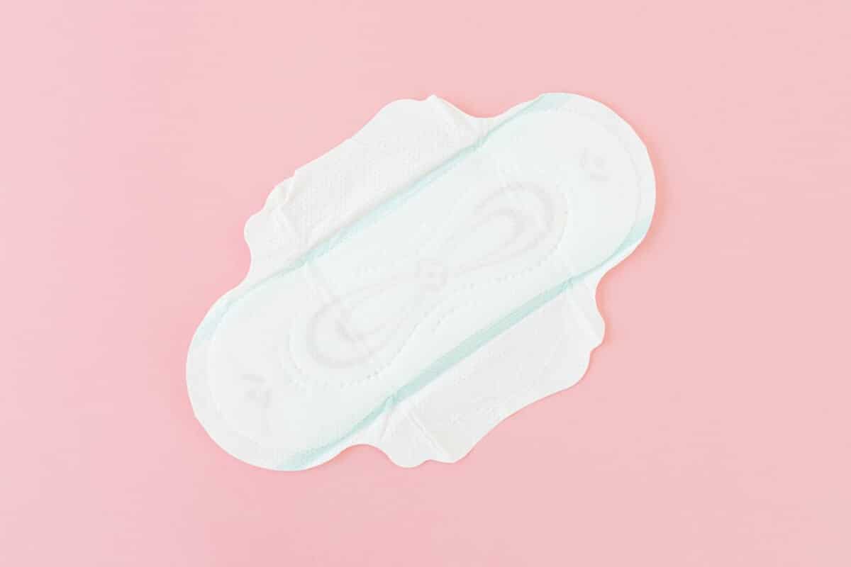 Sanitary towel on a pink background.