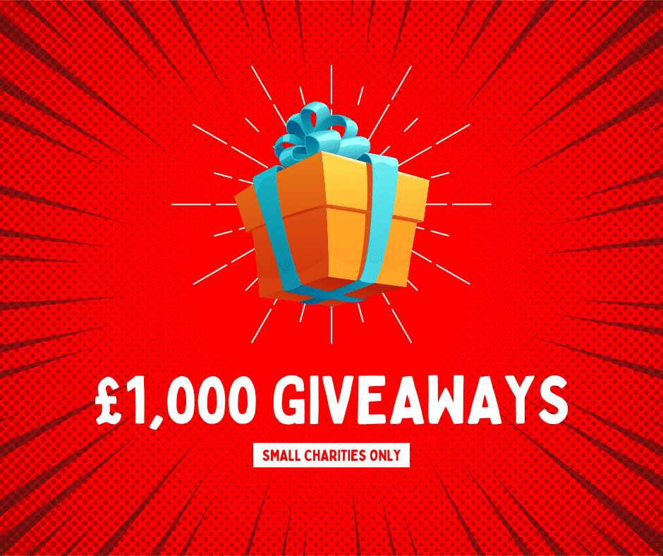 £1,000 giveaways, small charities only. A present wrapped with a blue bow on an exploding red background.