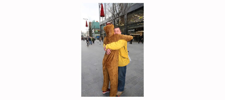 Alphacare bear gets a hug on the streets of Liverpool