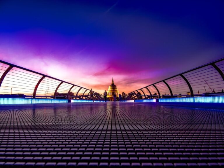 St Paul's Cathedral viewed from the south bank via the Millennium Bridge, at sunset.