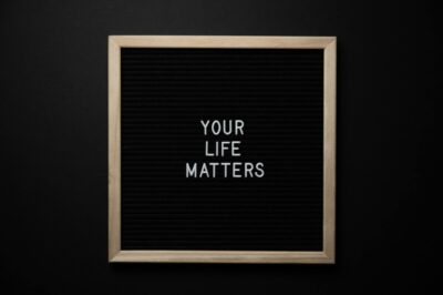 Your life matters. Framed sign with white letters on black background.