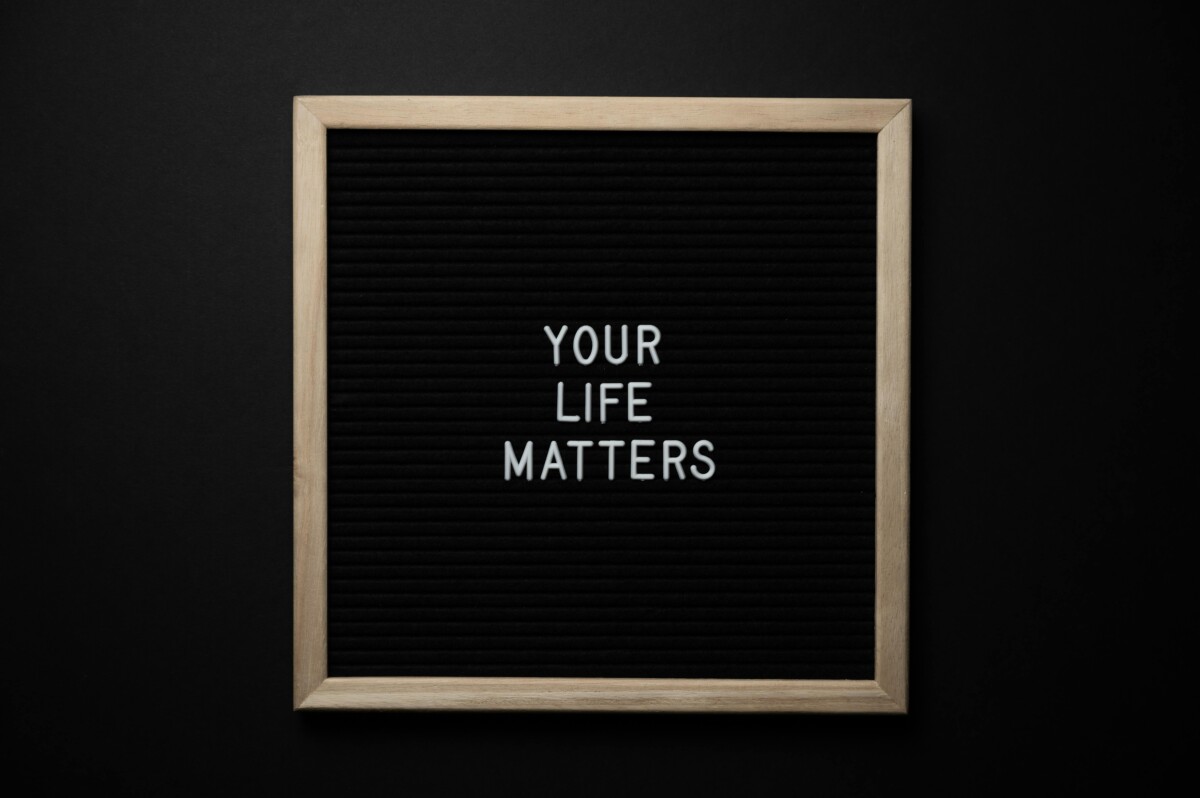 Your life matters. Framed sign with white letters on black background.