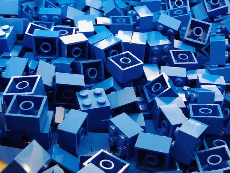 LEGO blue bricks in a pile.