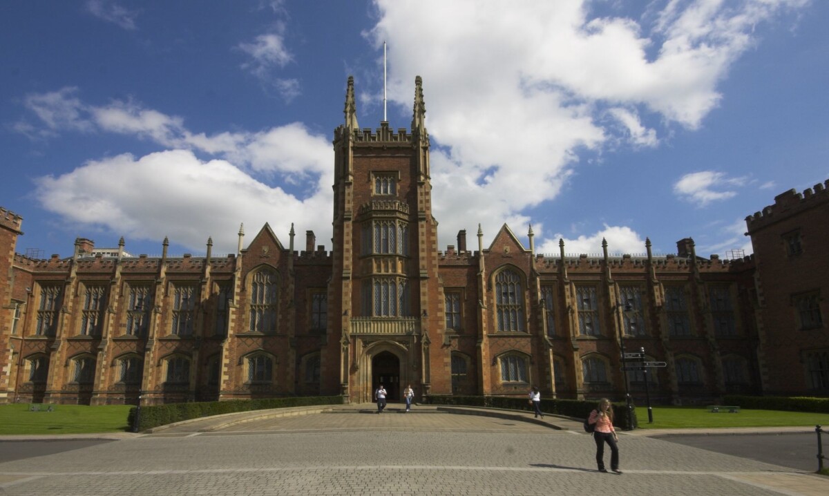 Queen's University Belfast against a blue sky.