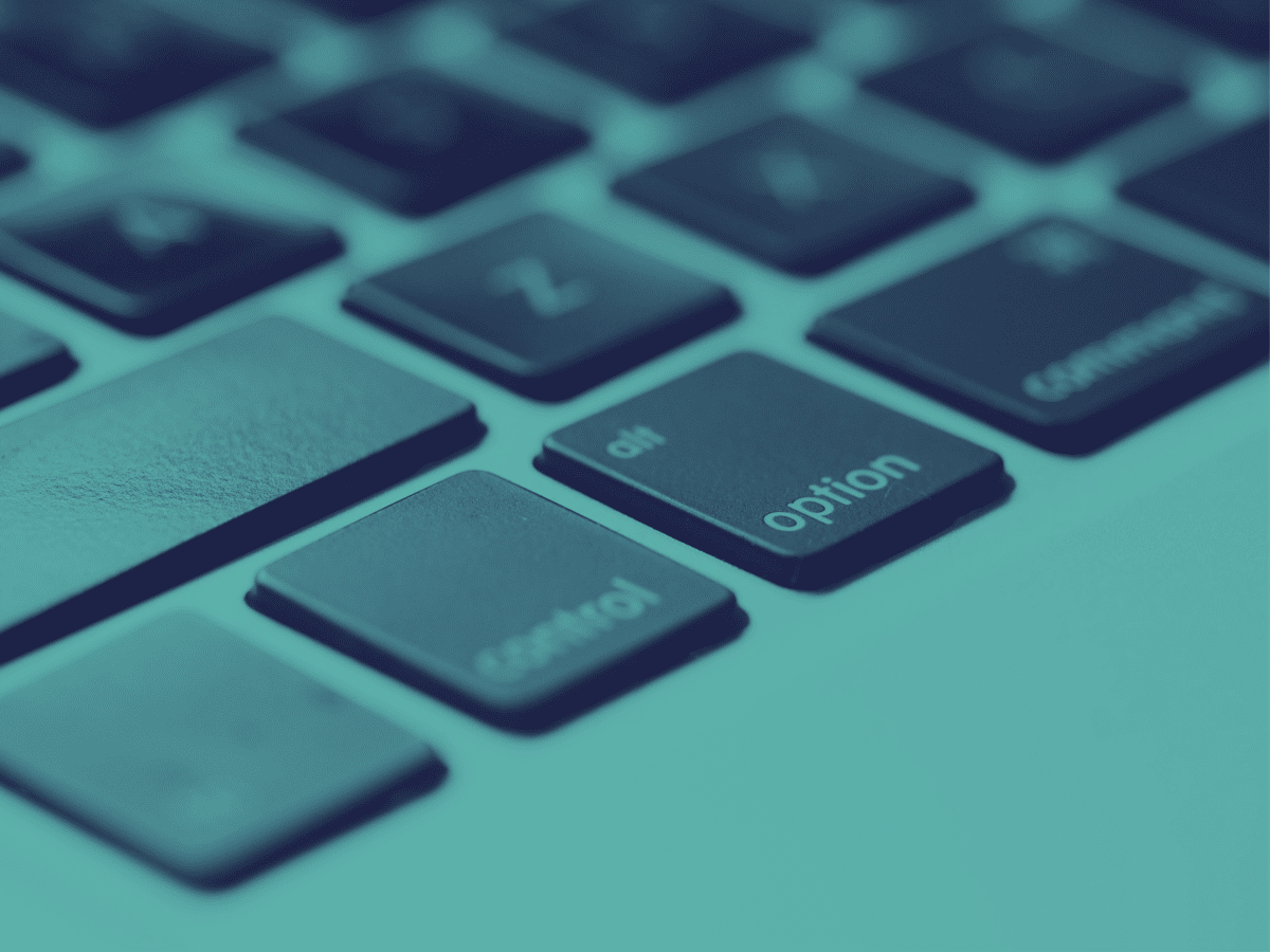 Mac keyboard (blue tones). Original photo: Photo by Jess Bailey Designs from Pexels: https://www.pexels.com/photo/close-up-photography-of-macbook-keyboard-810079/