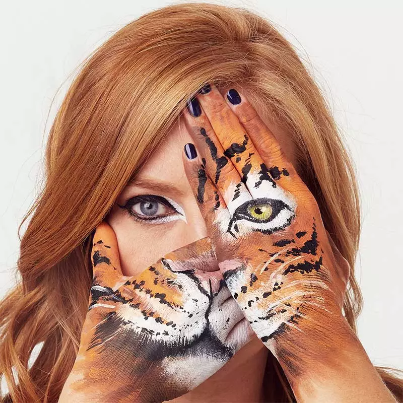 Sarah-Jane Mee with tiger hands for WWF Wear it Wild