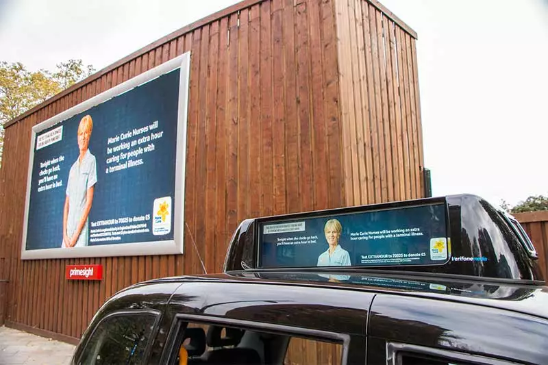 Marie Curie's Extra Hour campaign poster and taxi ad