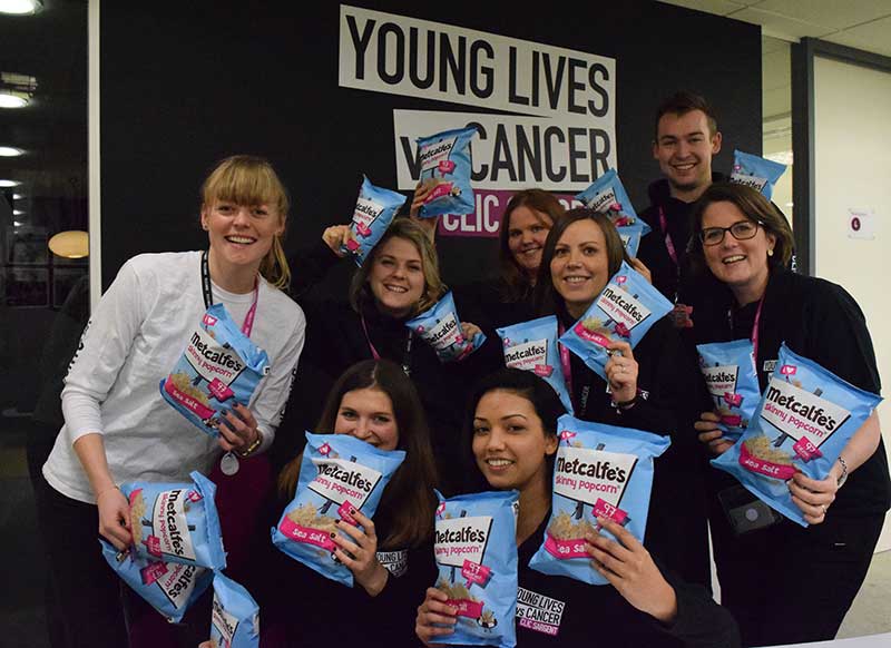 CLIC Sargent staff celebrate Metcalfe's popcorn fundraising total