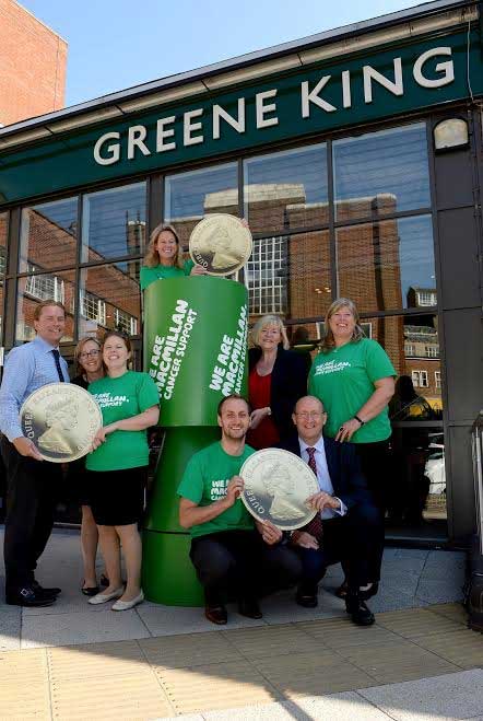 Greene King employees celebrate 2014’s fundraising total for Macmillan Cancer Support