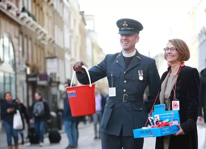 Two Poppy Appeal collectors fundraising for the Royal British Legion