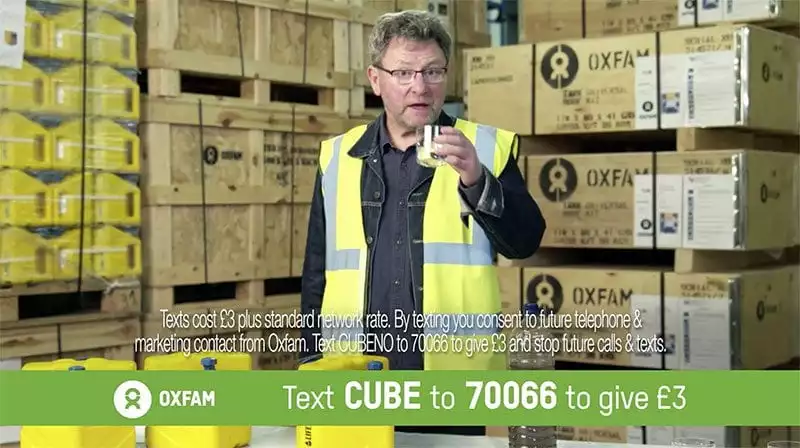 Oxfam's Ian Bray demonstrates impact of the Lifesaver Cube in TV advert