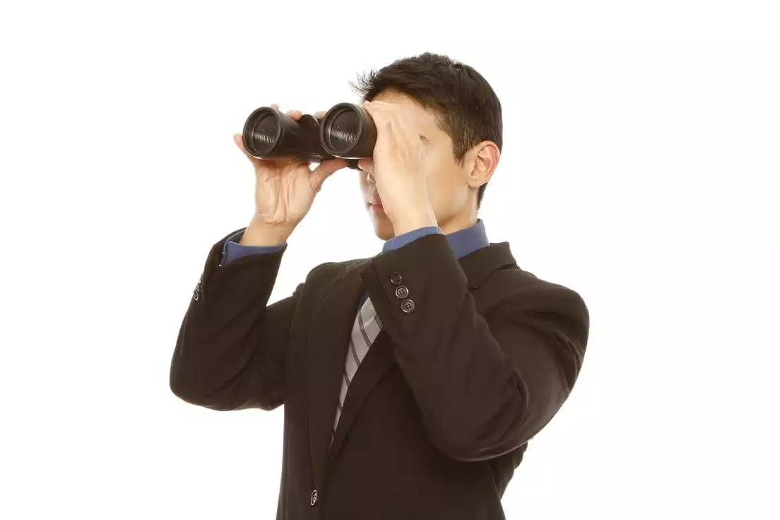 Long-term view: man with binoculars