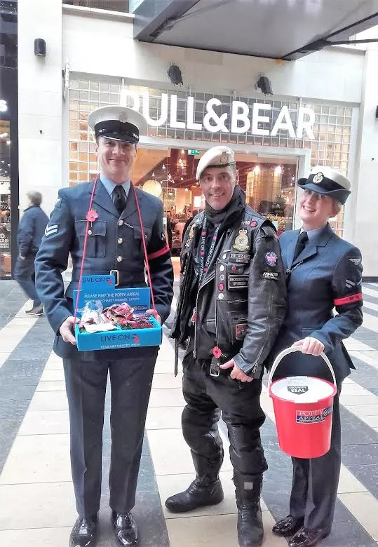 Poppy appeal collectors in military uniform