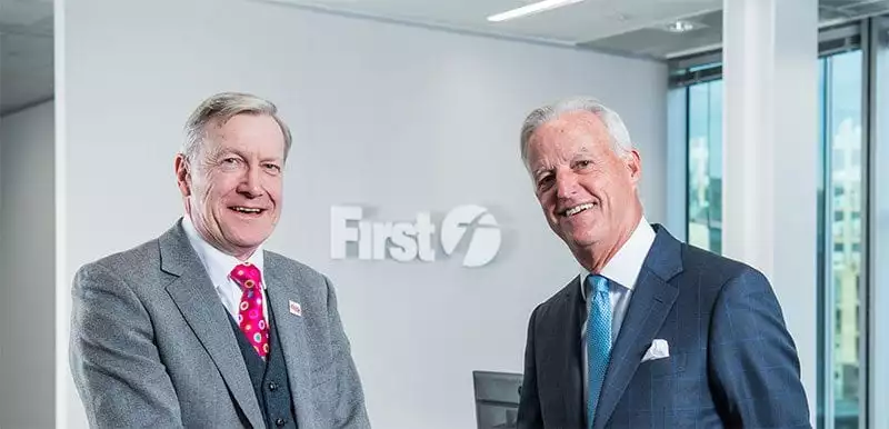 Action for Children CEO Sir Tony Hawkhead with FirstGroup chief executive Tim O'Toole
