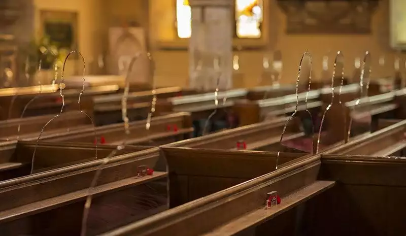 There But Not There silhouettes in church pews
