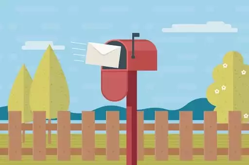 Envelope flying into US-style post box