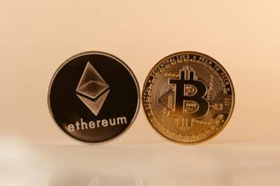 Physical mockups of cryptocurrencies ethereum and bitcoin.