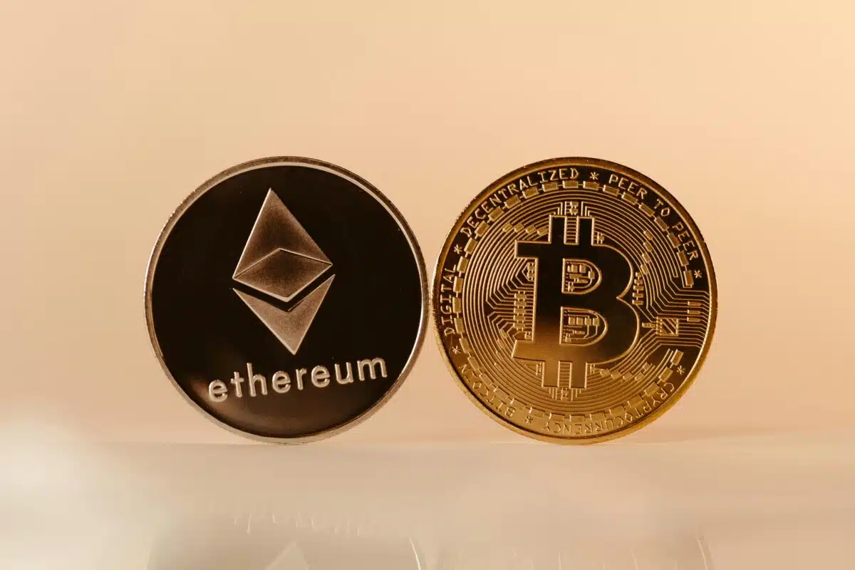 Physical mockups of cryptocurrencies ethereum and bitcoin.