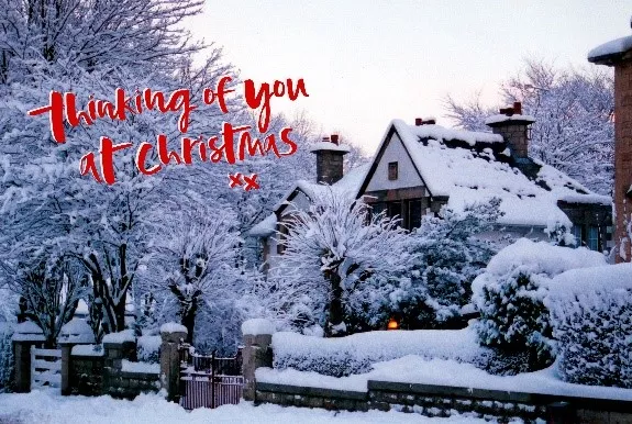 Christmas card snow scene, with text "thinking of you at Christmas"