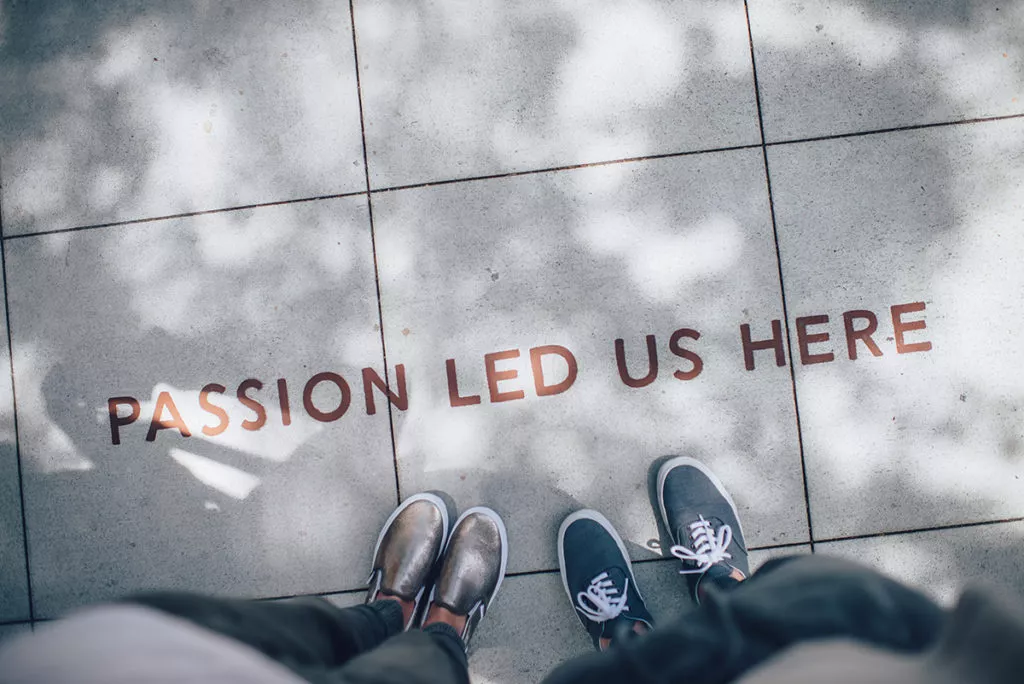 Passion led us here - sign on the pavement. Photo: Unsplash
