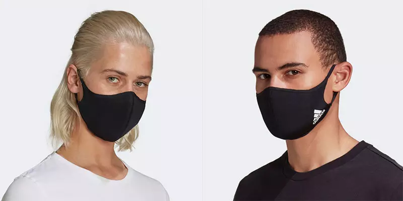 Woman and man wearing Adidas-branded face masks