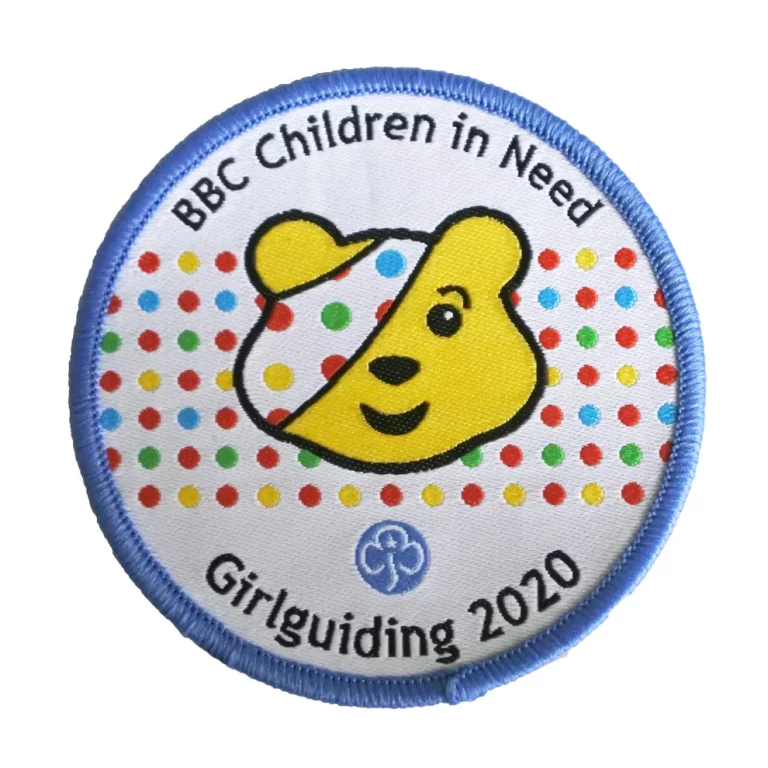 BBC Children in Need badge from Girlguiding, 2020. Illustration of the yellow teddy bear in the middle.