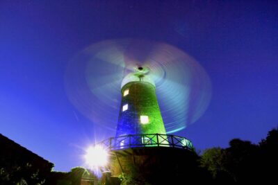 Greens Windmill at night lit up by Jamie Duff Greens Windmill Trust