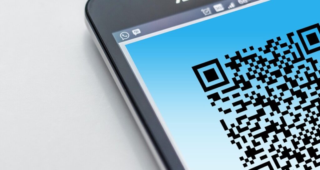 A QR code on a mobile phone Gerd Altmann from Pixabay 
