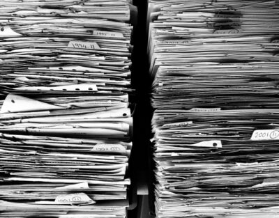 Piles of files (black and white photo). Image: Pixabay.com