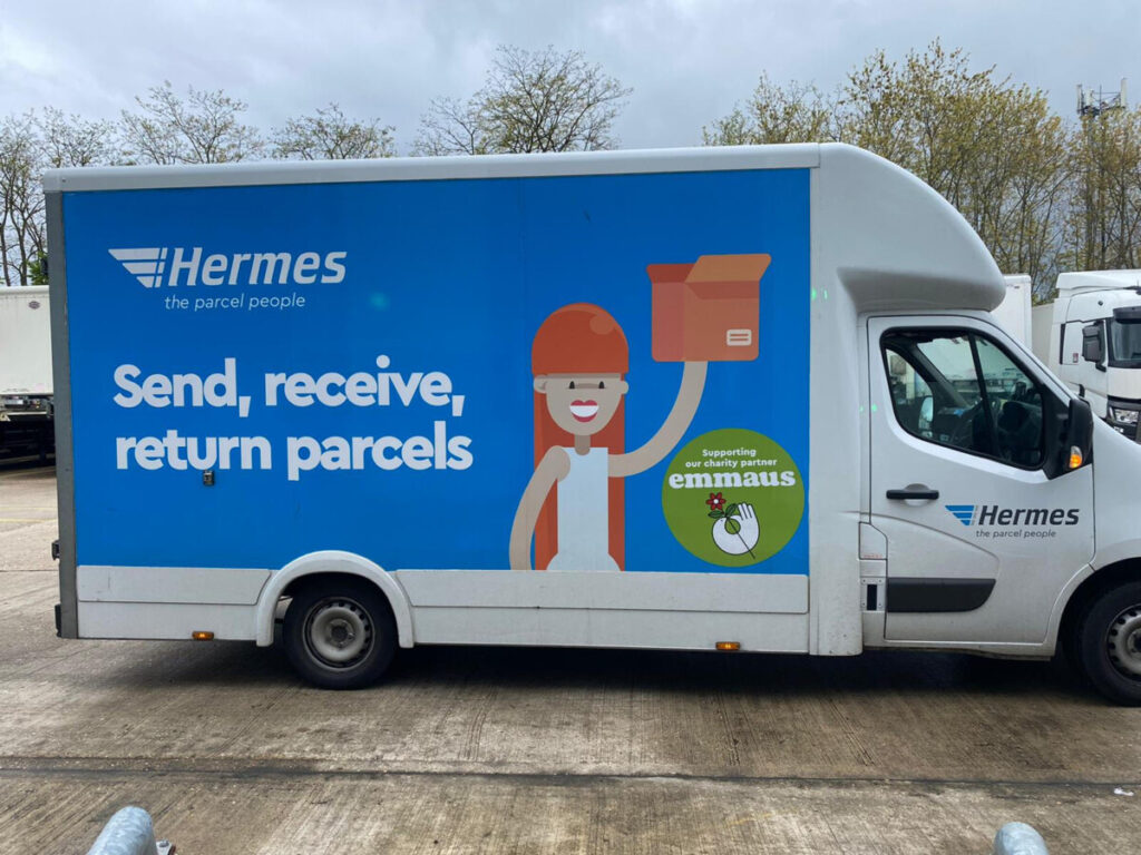 Hermes vans with Emmaus logo on the side