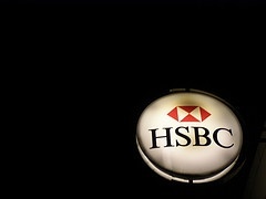 HSBC Bank logo, illuminated against the night. Photo: Adam UXB Smith on Flickr.com
