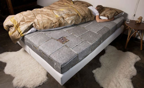Duvet and sheet that look like the pavement and a sleeping bag