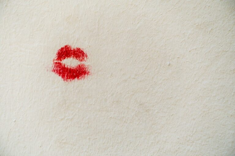 Lipstick kiss on a wall. Unsplash