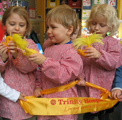 School children with models of Easter chicks