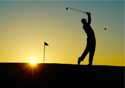 A man playing golf in the sunset. Photo: Pixabay