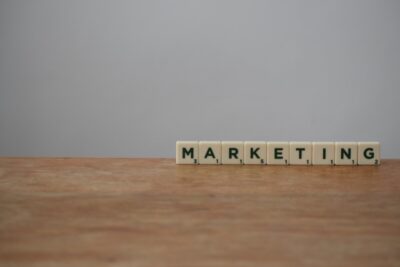 'Marketing' in Scrabble tiles on a table - photo: Pexels.com