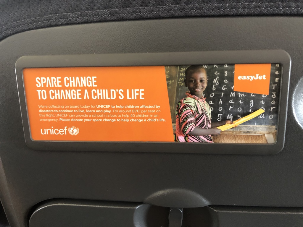 Unicef's Spare Change to Change a Child's Life on the seat-back of an easyJet aircraft. Photo: Howard Lake