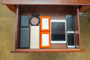 Drawer-full of unwanted mobile phones and devices. Photo: Vodafone