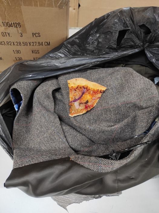 a slice of pizza on coat