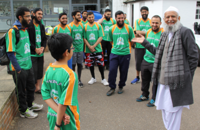 Jamia Al Karam fundraising event participants in green t-shirts. Photo: Enthuse.com
