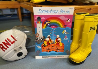 Somewhere for US magazine with RNLI yellow wellies and helmet