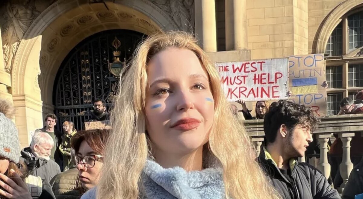Mariia R from Ukraine, crowdfunding to help her continue her UK studies, at a Ukrainian rally. Photo: Mariia R via GoFundMe.