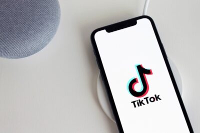 A phone showing TikTok. By Antonbe on Pixabay