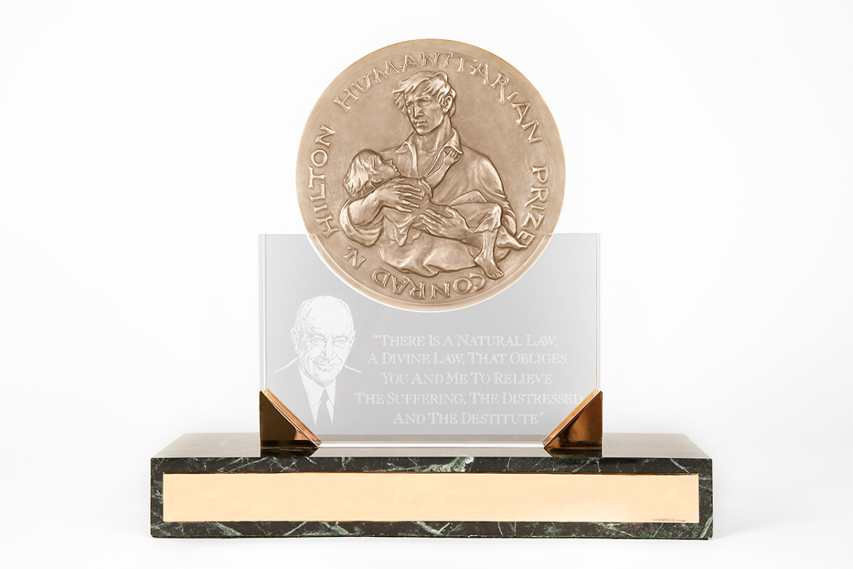 Conrad N Hilton Humanitarian Prize sculpture and medal