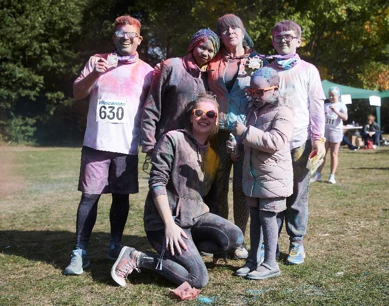 Greenwich & Bexleyheath Hospice colour run participants, covered in paint