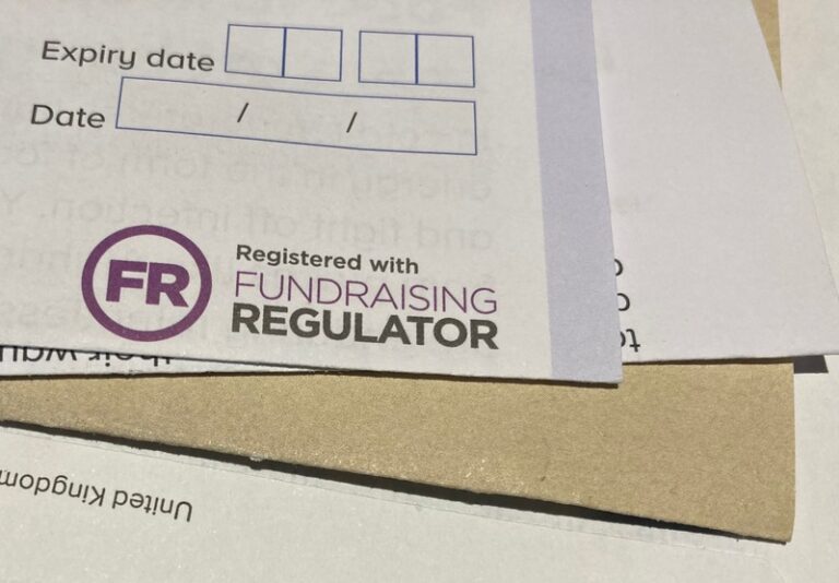 Fundraising Badge on a letter