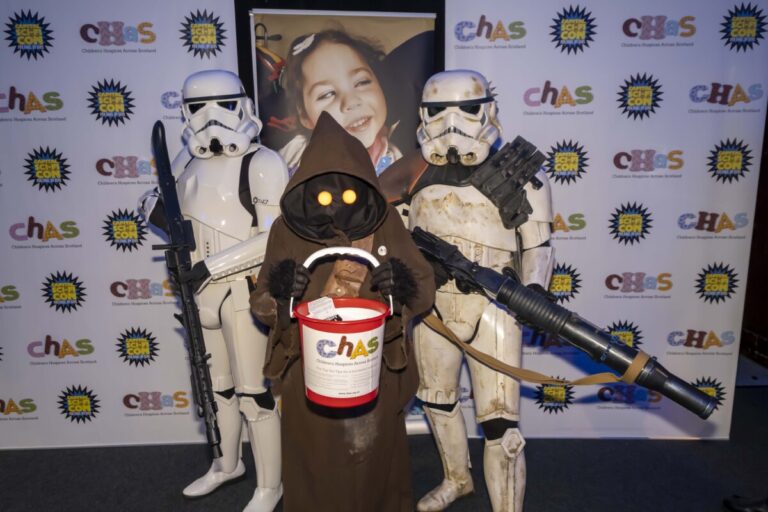 Stormtroopers and an ewok hold a CHAS donation bucket at Comicon. Pic: Peter Devlin