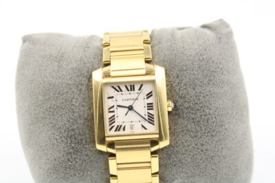 A gold Cartier watch found by BHF in a bag of donations and sold for almost £10k